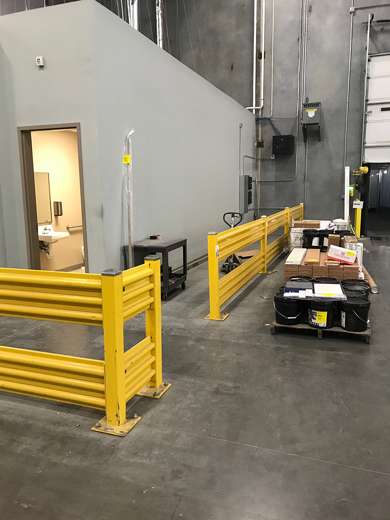 High-density narrow aisle pallet racking system for maximizing warehouse handling equipment efficiency