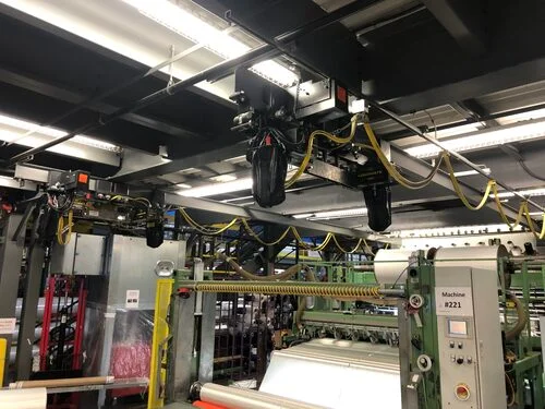 Custom structural mezzanine floor with safety handrails and stairs for warehouse handling equipment access